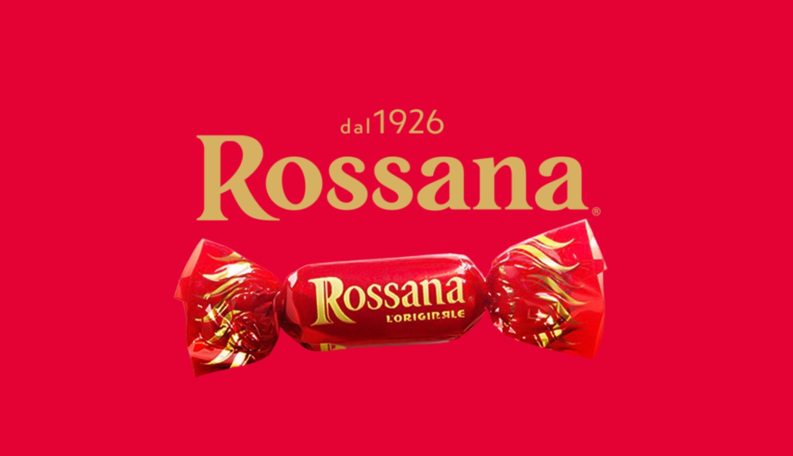 L’iconica Caramella made in Italy Rossana L’Originale avvolta nello storico incarto rosso e dorato, con il nome del marchio e la scritta 
